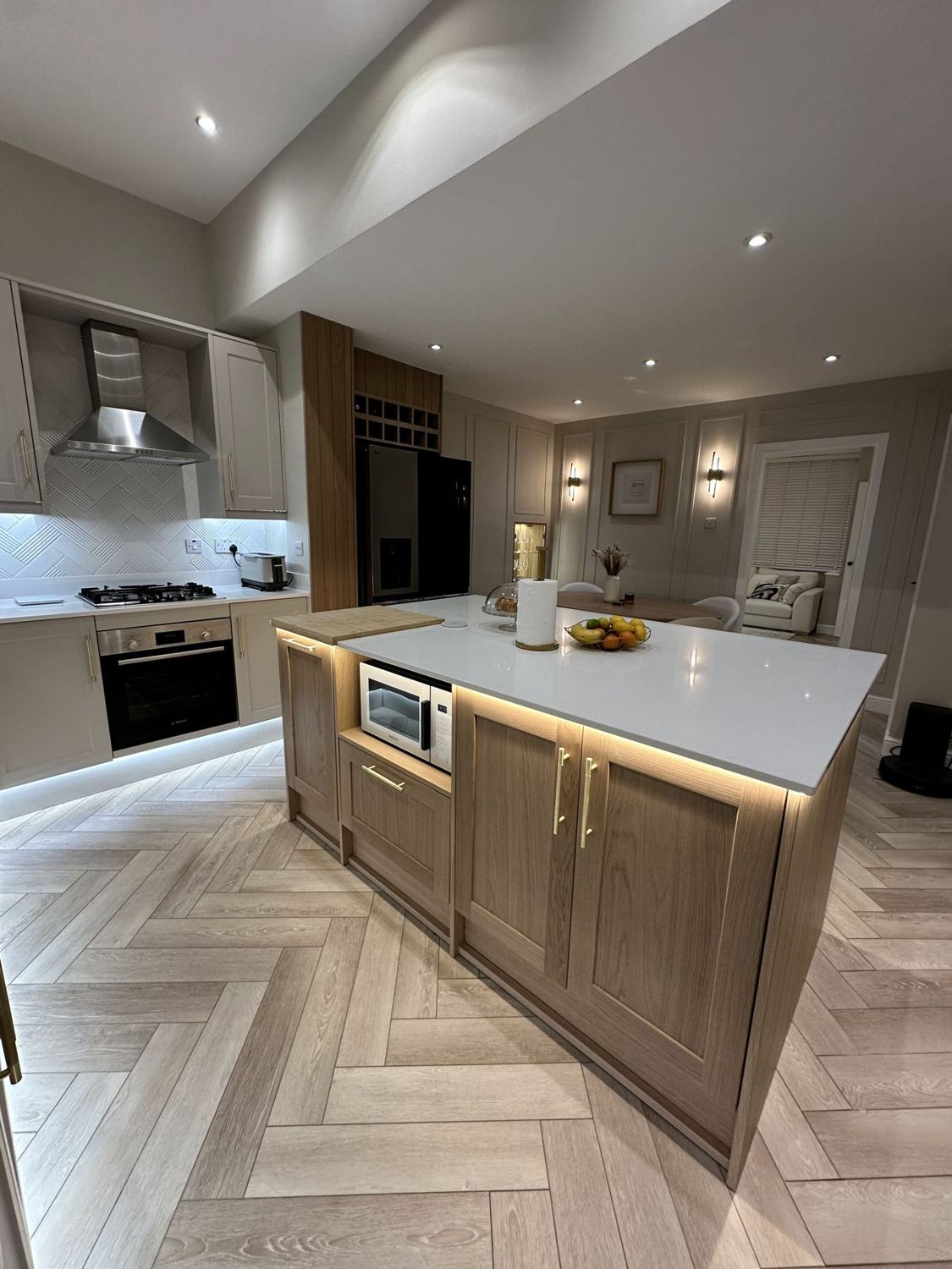 Kitchen island with LED lighting under the worktop